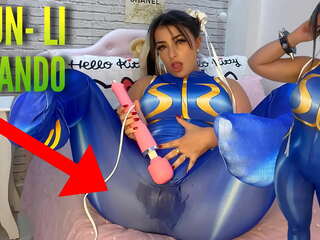 Fascinating cosplay lady dressed as Chun Li from street fighter playing with her htachi vibrator cumming and soaking her panties and pants ahegao